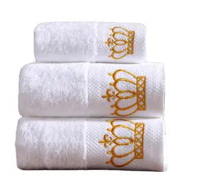 จีนอาลีบาบาผู้ผลิตโลโก้ที่กำหนดเองผ้าฝ้าย100% เทอร์รี่ด๊อบบี้สีขาวเย็บปักถักร้อยโรงแรมชุดผ้าขนหนูอาบน้ำ