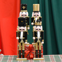 Casse-noix en bois noir et or en gros, cadeaux de Noël, marionnettes à main pour décorations de Noël