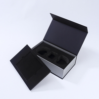 Boîte en carton rigide de luxe personnalisée noire avec insert en EVA, style livre, à ouverture magnétique