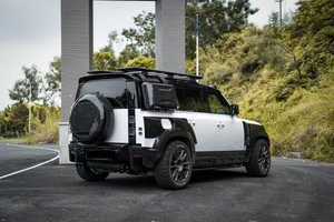 ชุดแต่งตัวถังรถยนต์ New ForLand Rover Defender (เม็กซิโก) ปี 2011-2016 รุ่นอัพเกรด Ke Style คาร์บอนไฟเบอร์ ประกอบด้วยลิ้นหน้า สเกิร์ตข้าง ดิฟฟิวเซอร์ สปอยเลอร์ และล้อ - Product Image 4
