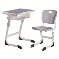 Ensemble bureau et chaise ergonomiques réglables en hauteur pour étudiants, avec dossier solide et structure métallique, idéal pour l'étude en classe