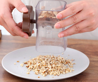 Handmatige roterende noten- en chocolademolen, mini plastic voedselvermaler, fruit- en groentesnijder/slicer, alleen handwas.