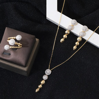 Parure de bijoux géométriques sphériques tendance pour femme, en cuivre plaqué bicolore, avec zircone pavée, comprenant collier à billes dégradées, boucles d'oreilles et bague