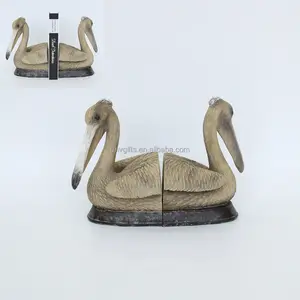 현대 해양 장식 독특한 수지 펠리칸 바다 새 컬렉션 북엔드 손으로 조각 된 동물 책 끝