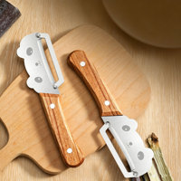 Nieuwe multifunctionele schilmes met houten handvat, nieuwe roestvrijstalen fruit- en groenteschiller voor pompoen en sla.