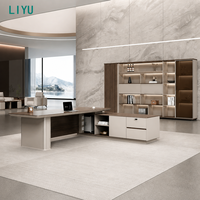 Ensemble de bureau exécutif LIYU en forme de L avec bibliothèque murale, rangement latéral, chaise à dossier haut, mobilier de bureau en bois avec éclairage LED et design cannelé