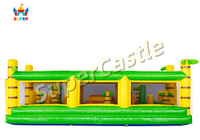 Parcours d'obstacles gonflable commercial sur le thème de la jungle avec mur d'escalade, toboggan et défis interactifs pour événements et divertissements