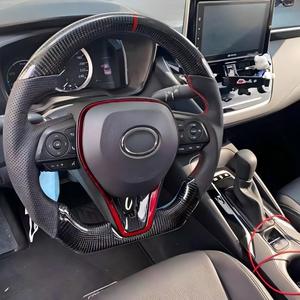 Volant de voiture personnalisé en fibre de carbone avec poignées en cuir blanc pour RAV4 Corolla Camry Yaris <span class=keywords><strong>Sport</strong></span> Design - Product Image 3