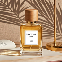 Bouteille de parfum en verre vide de luxe de 50ml avec bouchon de pompe et pulvérisateur à pompe La conception personnalisable unique comprend une boîte