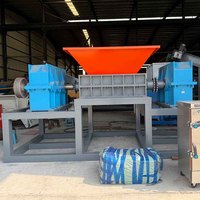 Broyeur de pneus à double arbre à prix d'usine, machine de recyclage de pneus robuste à double arbre avec système de contrôle PLC