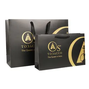 Bolsa de papel de regalo de compras de lujo negra con impresión de logotipo personalizado al por mayor bolsa de papel con asa con impresión de logotipo