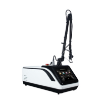 Machine laser CO2 fractionné 10600 nm avec tête de découpe gynécologique, refroidissement air-eau, et valise de transport aérien pour distributeurs de salons de beauté