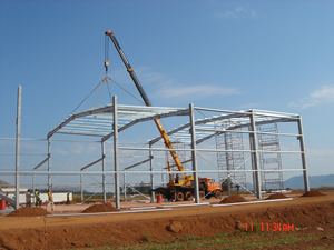 Structure en acier préfabriquée bon marché entrepôt usine atelier stockage hangar en métal usines à ossature en acier bâtiment magasin d'histoire - Product Image 6