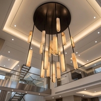 Lustre long personnalisé pour salle à manger, hôtel, bar, décoration intérieure, cadre en laiton de luxe, lampes suspendues en cuivre et en albâtre