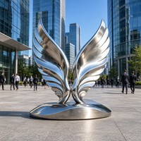 Sculpture d'ailes d'ange en acier inoxydable 3D poli avec des thèmes de fée et de musique - Art moderne pour la fête nationale ou les cadeaux de Noël
