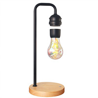 Meilleure qualité lampes de table à lévitation magnétique lampe de bureau LED flottant avec lumière blanche chaude économie d'énergie charge sans fil