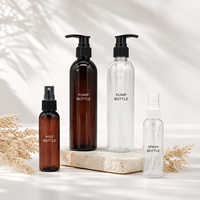 Prix de gros – Flacons pompe ronds en PET transparent ou ambré de 2 oz et 8 oz pour emballages cosmétiques et soins de la peau