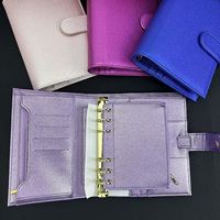 Organisateur de carnet portable multifonctionnel de style portefeuille avec reliure métallique et ferrures dorées, à usage quotidien, avec plusieurs poches et fermeture éclair