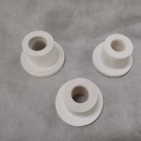 Blocs d'étanchéité en fibre céramique thermoformés avec trous pré-perforés pour la protection de l'entrée des éléments chauffants