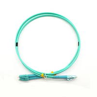Cordon de brassage fibre optique multimode OM3 SC/LC, câble MPO poli de 3,0 mm de diamètre en PVC LSZH Aqua, idéal pour les applications FTTX - Vente Flash