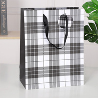 Customized Wholesale Classic Recycled Paperboard Craft Gift Packaging Bags Cute Animal Christmas Pattern Offset Printed Ribbon