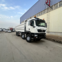 Camion benne Sinotruk HOWO TX 8x4 reconditionné fiable avec moteur MAN, d'occasion, pour l'exploitation minière intensive