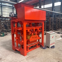 Machine à briques autobloquantes à fonctionnement rapide, semi-automatique, pour la fabrication de briques en ciment et de briques creuses pour briqueterie