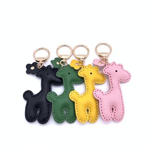 พวงกุญแจหนังแท้รูปยีราฟน่ารัก <span class=keywords><strong>สี</strong></span>สันสดใส ตกแต่งกระเป๋าถือ กระเป๋าเป้สะพายหลัง - Product Image 1