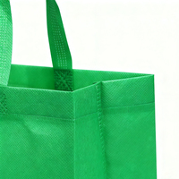 Sac fourre-tout vert uni non tissé recyclable avec poignée en tissu intégrée, sac de transport écologique réutilisable pour vêtements
