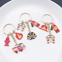 Porte-clés de pompier de 3 cm de large, porte-clés en métal émaillé avec charme casque de camion de pompiers, souvenir du service d'incendie, 3 styles, vente en gros