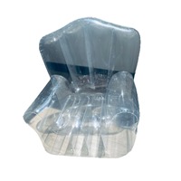 Fauteuil gonflable transparent en PVC, style photographie intérieur et extérieur, design artistique européen, pour une relaxation décontractée