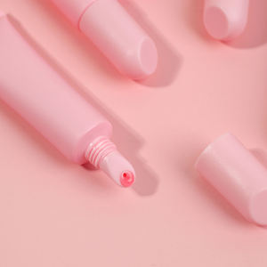 Pink Soft Tube Heiß verkaufendes Lippen öl Kamelien samen öl Feuchtigkeit spendendes, langlebiges, veganes Lippen balsam Gute Qualität OEM Lip Plumper Oil - Product Image 1