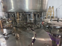 Máquina Llenadora de Aceite Rotativa Smart-Control 3000-25000BPH para Botellas de PET, para Aceite de Soja, Girasol, Sésamo, Coco y Aguacate