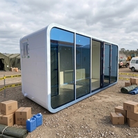 Petite maison préfabriquée écologique, structure en acier, prête à être expédiée pour usage commercial ou bureautique.