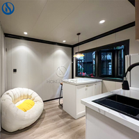 Cabine préfabriquée moderne extensible à double aile pliante, maison conteneur en acier respirant de 20 pieds ou 40 pieds, garantie 1 an