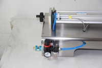 Machine de remplissage G1WG à tête unique pour sirops épais, miel, huiles essentielles, shampoings, crèmes, lotions, eaux, liquides, laits et pâtes en bouteilles