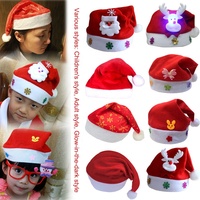 Vente en gros de chapeaux de Noël LED avec des motifs de dessins animés de Noël, bonhomme de neige, renne, Père Noël, chapeau de fête de Noël pour adultes et enfants, accessoire de costume