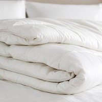 Couette de luxe régulatrice de température en viscose de bambou respirante et absorbant l'humidité pour toutes les saisons