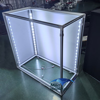 Comptoir de salon professionnel Portable de haute qualité podium d'événement en métal SEG publicité graphique LED Table de tissu de Tension rétroéclairée à vendre