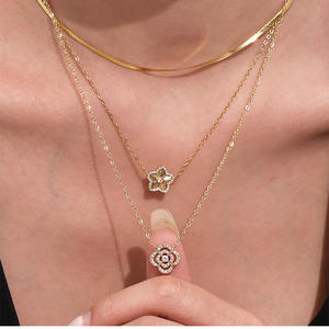 Nuevo Conjunto de Collar y Pulsera de Doble Capa con Trébol de Cuatro Hojas y Estrella de Cinco Puntas de Acero Inoxidable de Lujo de Moda para Mujer - Product Image 1