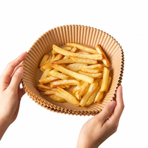 Papier sulfurisé rond brun jetable antiadhésif résistant à l'huile pour friteuse à air, four et rôtissage - Product Image 1