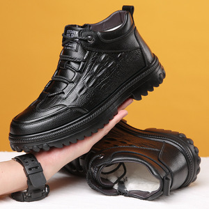 Botas de nieve para hombre, de cuero negro, forradas de lana, con suela gruesa, zapatos cálidos para clima frío. - Product Image 1