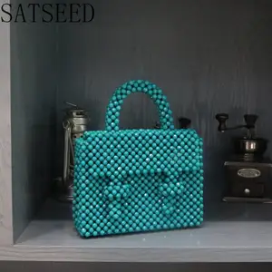 Kunden spezifische Bolsos Mujer Damen Retro einfache Handheld-Welle Neu im Handag Design Vielseitige Arbeit Promi hand gewebte Perlen Tasche