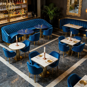 Table ronde carrée de luxe en pierre frittée, canapé banquette en velours bleu foncé, mobilier personnalisé pour hôtels et restaurants - Product Image 1