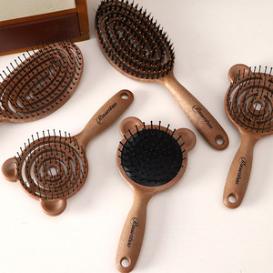 Peigne de massage antistatique à grain de bois - Double usage pour cheveux humides et secs, brosse à cheveux en forme d'ours avec coussin d'air pour masser le cuir chevelu - Product Image 1