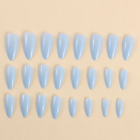 Faux ongles à presser de style européen et américain, bleu clair uni, forme amande, longs, pré-conçus, détachables, minimalistes et d'aspect premium