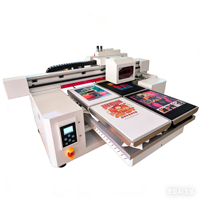 Imprimante DTG haute vitesse à quatre stations avec têtes d'impression I3200 pour l'impression de motifs personnalisés sur t-shirts en coton pur textile