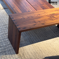 Table basse multifonctionnelle NORYA en bois massif avec plateau épais et patins de protection pour salon, mobilier en noyer