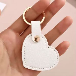 New Creative PU <b>Leather</b> Heart Keychain Simple Bag Pendant Cute Love Shape Couple Charm Fashion Accessories for Handbag Gift - Product Image 4