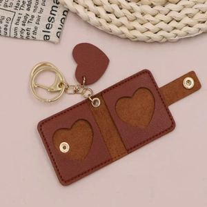 YY Cute Heart Shape Photo Storage Case Pendant Mini PU Leather Picture Holder Bag Charms Photo Keeper Keychain for <b>Memory</b> & <b>Gift</b> - Product Image 3